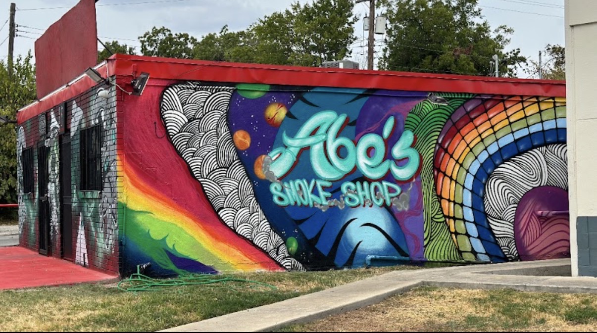 Abe's Smoke Shop Central storefront at 4709 Airport Blvd